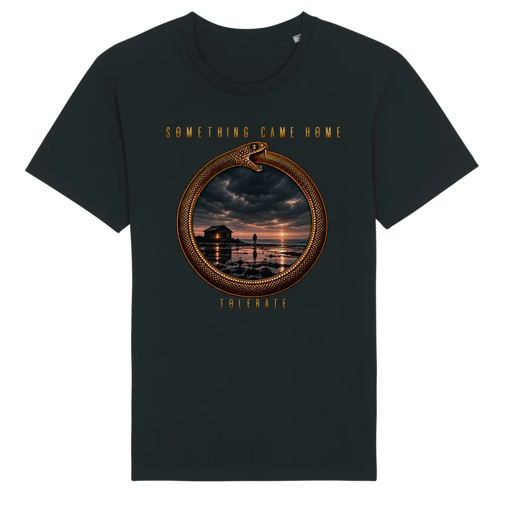 Color tee in Black, front view: gold ouroboros ring framing a stormy sunset over a tidal flat, with the band name above and TOLERATE below.